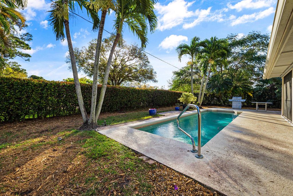 Photo of 3003 SW Seaboard Avenue, Palm City, FL 34990 (MLS # R10959222)