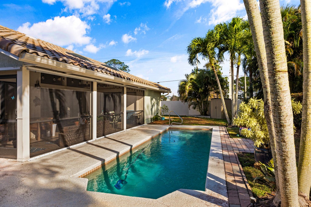 Photo of 3003 SW Seaboard Avenue, Palm City, FL 34990 (MLS # R10959222)