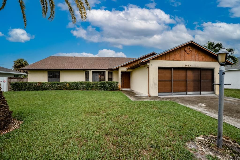 Photo of 2033 SE Camden Street St, Port Saint Lucie, FL 34952 (MLS # R10833807)