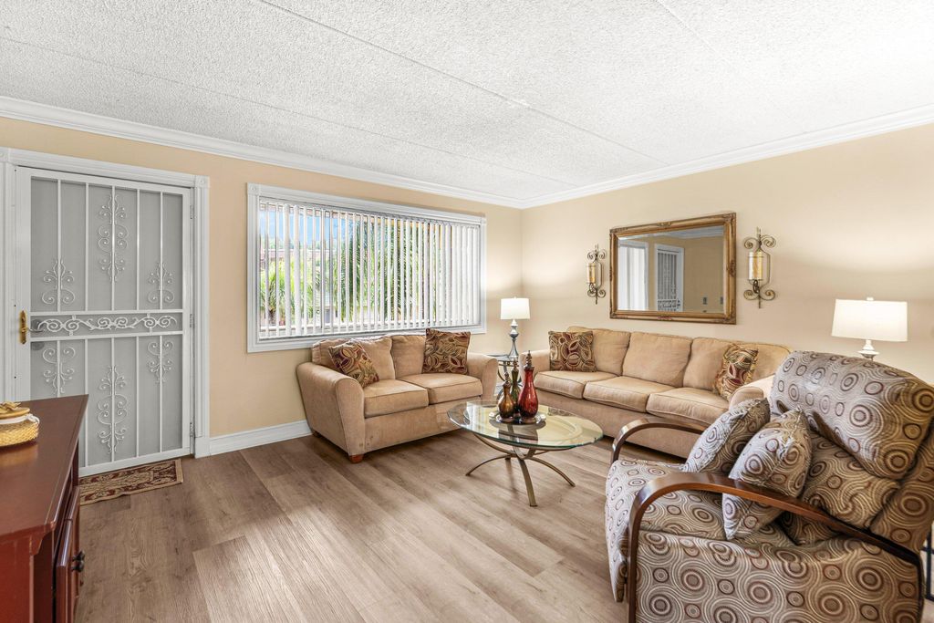 Photo of 600 Village Green Court, Palm Springs, FL 33461 (MLS # B26019103)