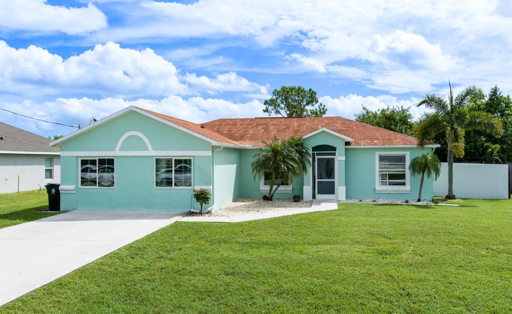 Photo of 6453 NW Volucia Drive, Port St Lucie, FL 34986 (MLS # R10915049)