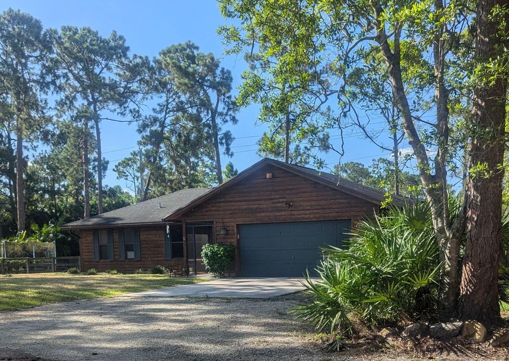 Photo of 17025 Temple Boulevard, The Acreage, FL 33470 (MLS # R11109542)
