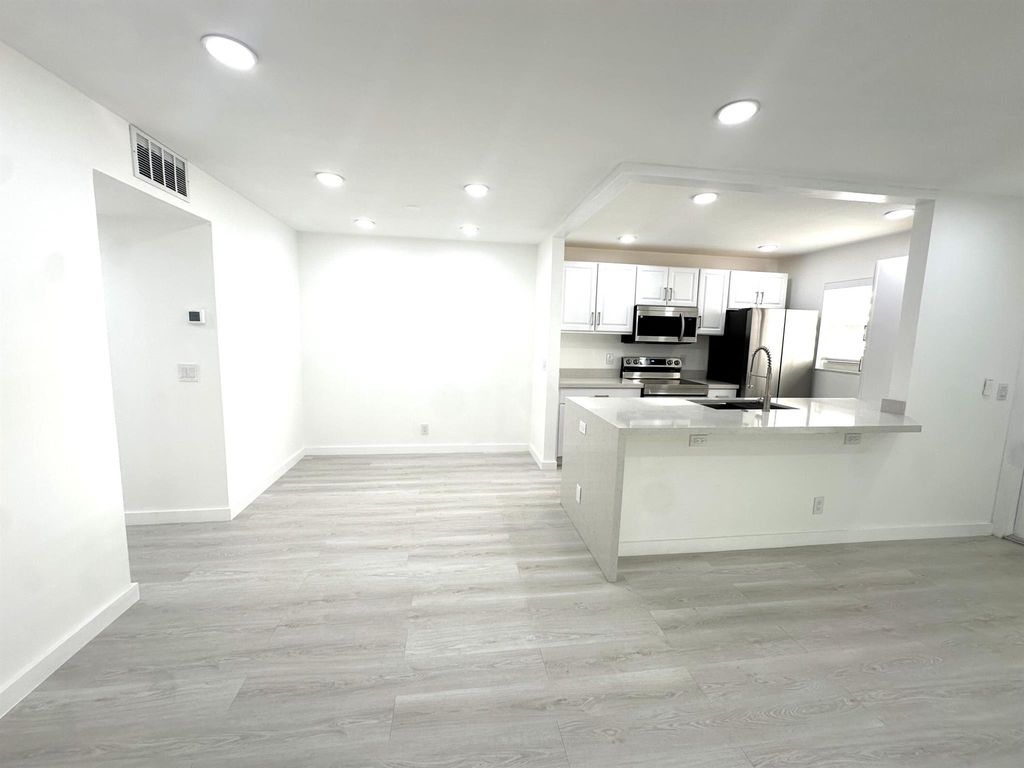 Photo of 887 North Drive #A, Delray Beach, FL 33445 (MLS # R11129090)