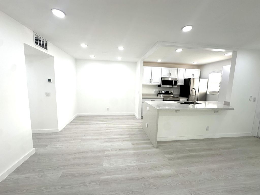 Photo of 887 North Drive #A, Delray Beach, FL 33445 (MLS # R11129090)