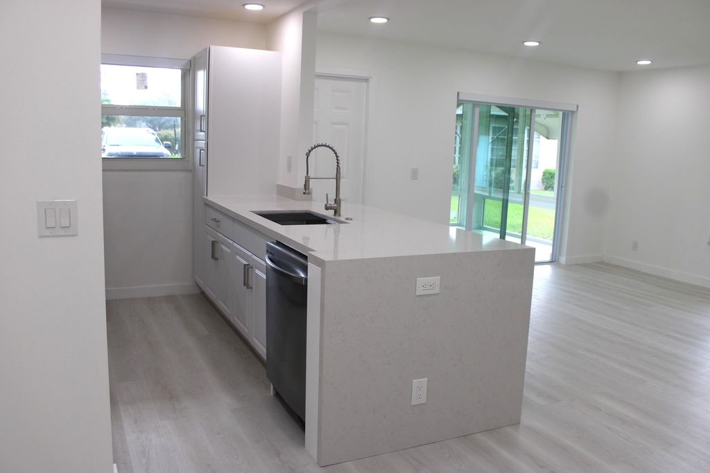 Photo of 887 North Drive #A, Delray Beach, FL 33445 (MLS # R11129090)