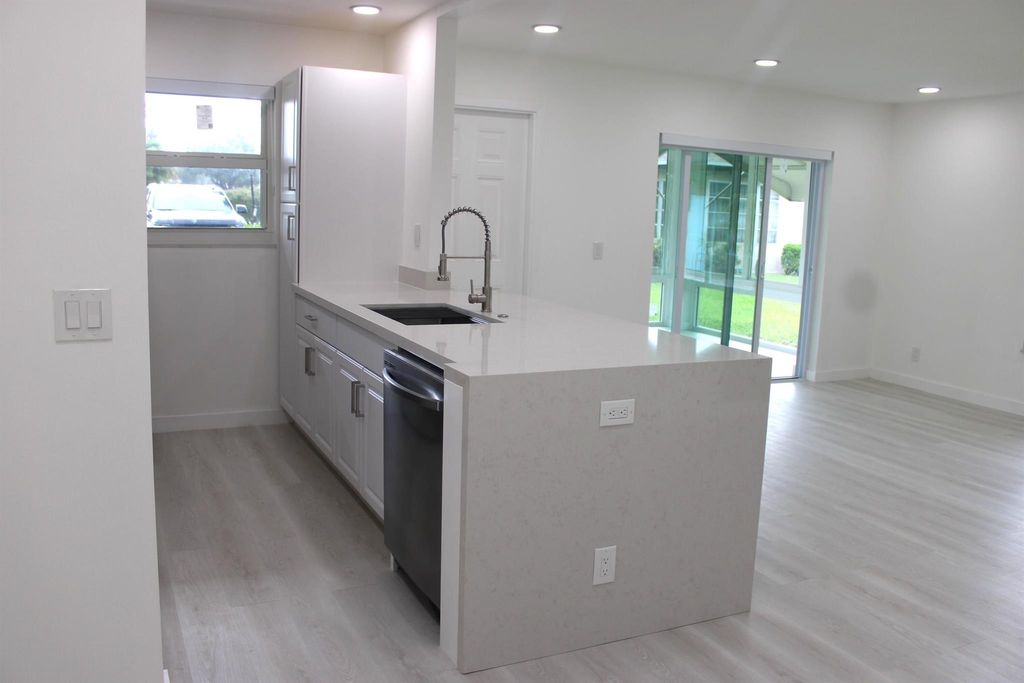 Photo of 887 North Drive #A, Delray Beach, FL 33445 (MLS # R11129090)