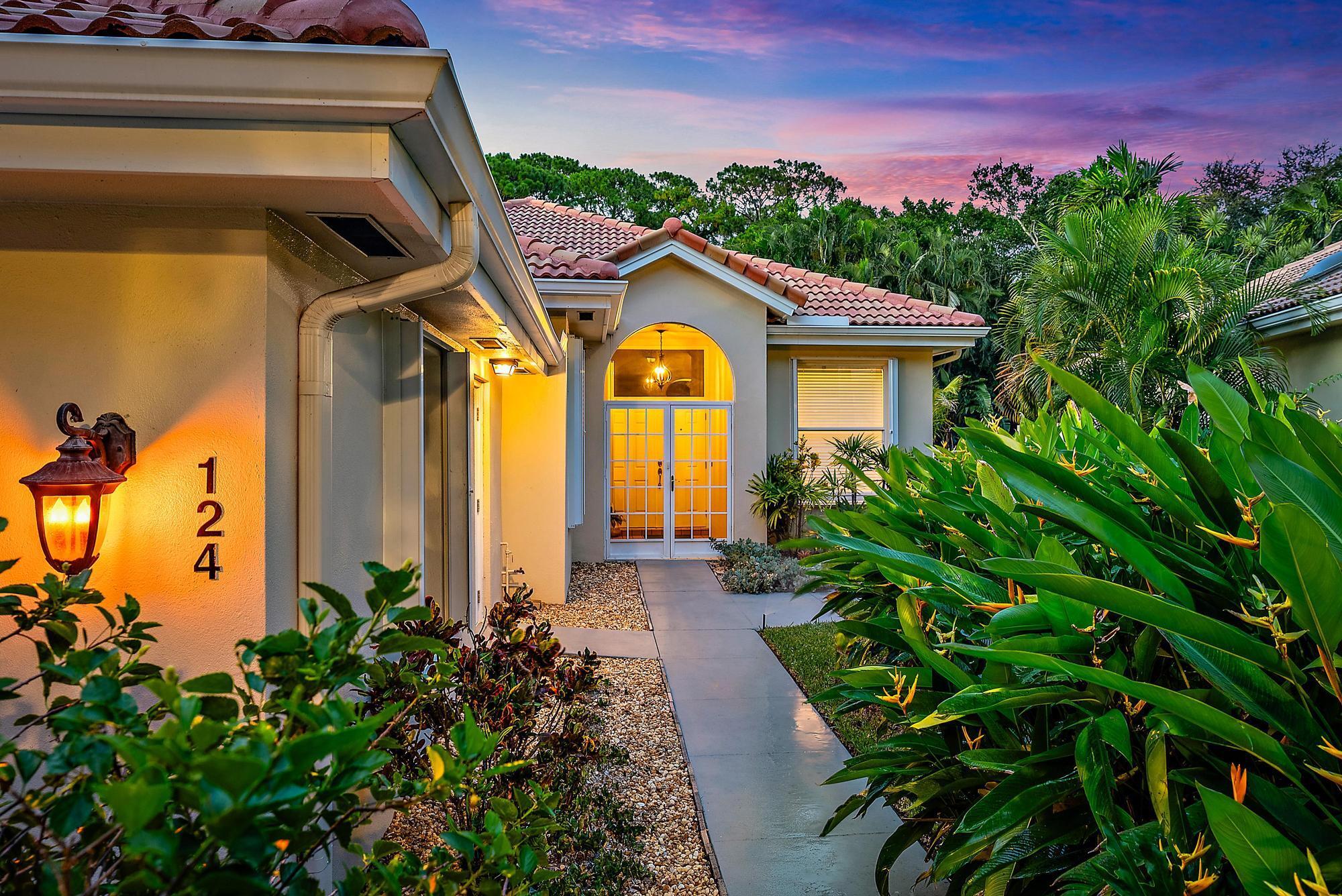 Welcome to this beautifully maintained DiVosta-built home in the desirable Hamptons at Maplewood, nestled in the heart of Jupiter. This solid CBS-constructed residence offers 3 spacious bedrooms, 2 full bathrooms, and nearly 2,000 square feet of thoughtfully designed living space, blending comfort, elegance, and functionality. From the moment you step inside, you'll be welcomed by elegant crown molding, tasteful architectural details, and the timeless appeal of tile flooring throughout--all beautifully framed by a light-filled, open floor plan. The kitchen is a true centerpiece of the home, featuring upgraded cabinetry, a striking waterfall-edge quartz countertop, and newer GE appliances that make cooking and entertaining a pleasure.