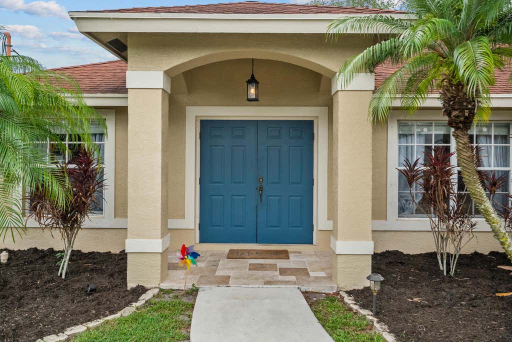 Photo of 1913 SW Aladdin Street, Port Saint Lucie, FL 34953 (MLS # R10988259)