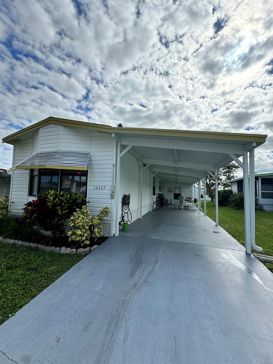 Immaculate 2 bedroom 2 bath home located in the desirable 55 + Spanish Lakes Fairways community. Split floor plan. Home has laminate floors throughout. NO CARPET. Open kitchen, screened in patio with windows off living room. Bathrooms have new vanities and toilets. Large carport space and large 8 X11 shed. Home is being sold FURNISHED. A/C 2015, Water heater is 2022. Washer machine is 2017. Appliances are in great shape. Amenities include Private 18 hole golf course, 2 pools, pickle ball, tennis, shuffleboard, bocce, gym, library, wood workshop and much more. Low Lot Rent. MUST SEE!