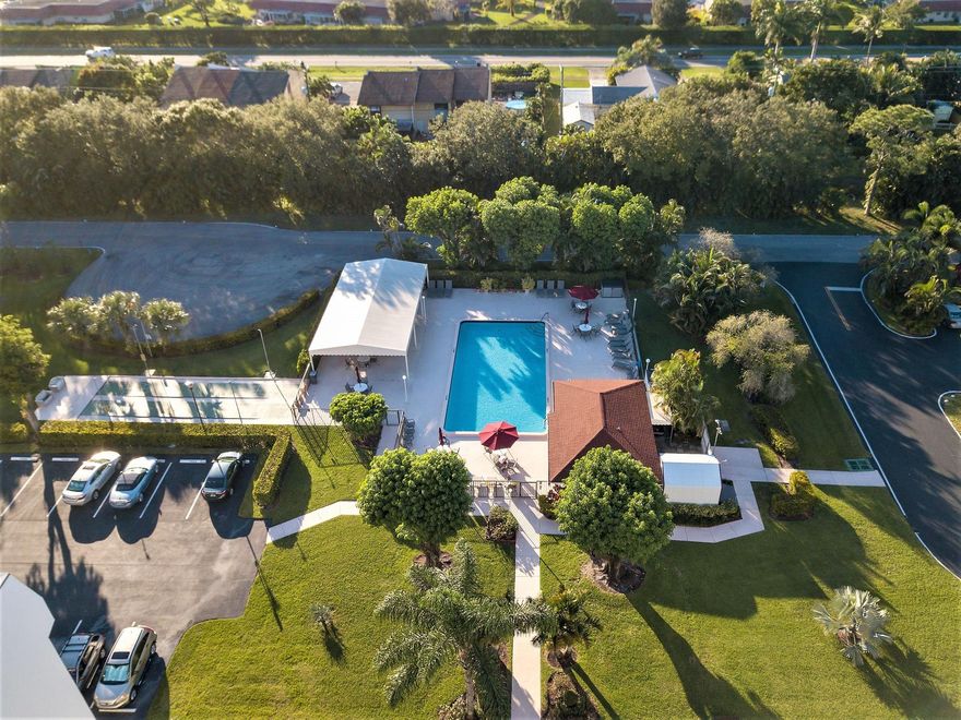 WELCOME TO THIS SPARKLING CONDO THAT HAS BEEN UPDATED THROUGHOUT! STAINLESS APPLIANCES,QUARTZ KITCHEN COUNTERTOPS, WASHER/DRYER, WOOD-LOOK LAMINATE FLOORING , WALK-IN SHOWER, BEDROOM WITH 2 WALK-IN CLOSETS.  ENJOY VIEWS OF THE GOLF COURSE & LAGOON FROM AN EASTERLY FACING SCREENED PATIO & ENJOY THIS GREAT LOCATION ACROSS FROM THE RESORT SYTLE POOL & CABANA AREA WITH WI-FI SERVICE.   USE THE WALKING PATH ACROSS THE GOLF COURSE TO POINCIANA'S CLUBHOUSE WITH PAY-AS-YOU-PLAY GOLF, PICKLEBALL, TENNIS, GYM, MEL'S BISTRO & ENTERTAINMENT & MORE!  CONDO FEE INCLUDES WATER,SEWER,PEST CONTROL, HOT WIRE TV & WIFI SERVICE & USE OF THE RECREATIONAL FACILITIES AS NOTED.  POINCIANA IS A 55+AGE RESTRICTED COMMUNITY.