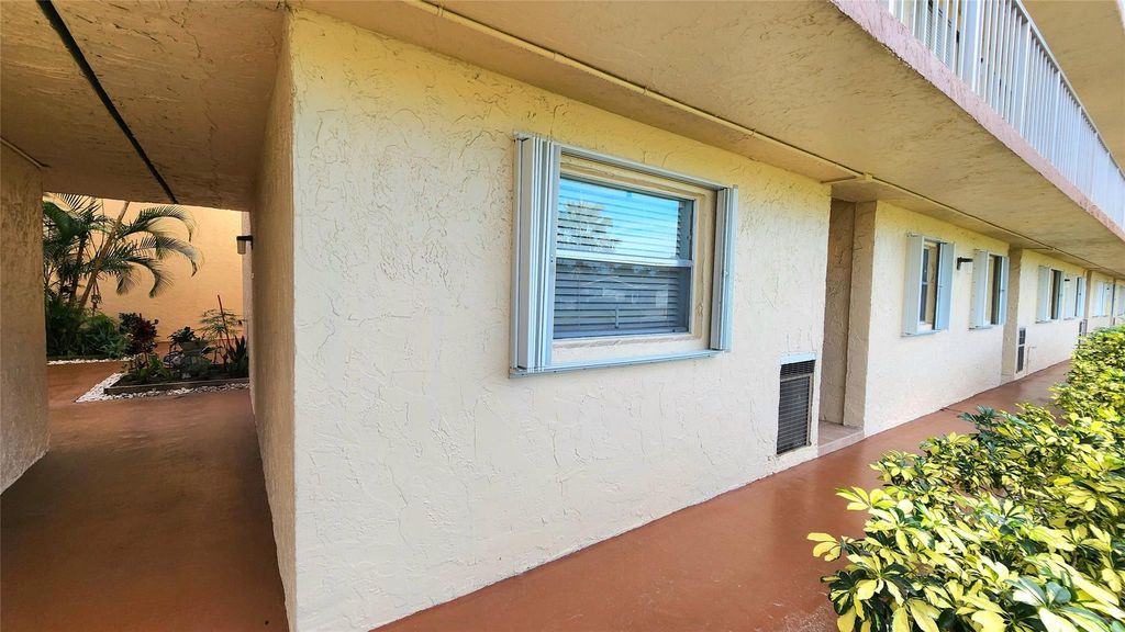 Photo of 700 SE 6th Ave #106, Deerfield Beach, FL 33441 (MLS # F10540753)