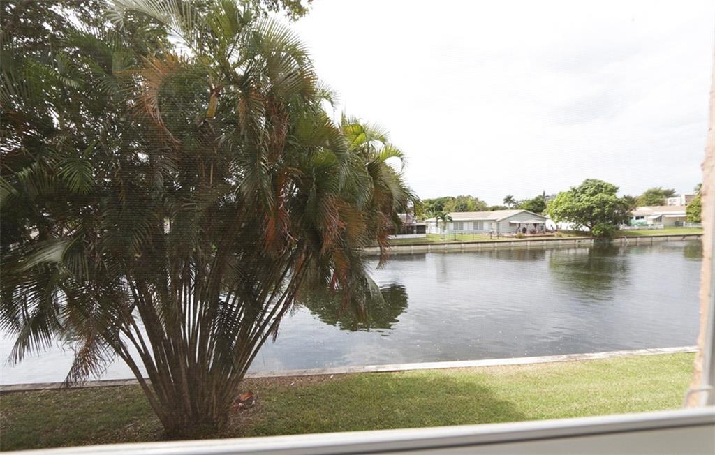 Make this highly desired sought after 55+ community of Lime Bay your home. This is a beautiful, light, bright remodeled large 2 bedroom, 2 bathroom corner unit. Enjoy a peaceful wide water view from every room. Laminate & tile flooring; custom cabinets & granite counters. This condo truly has all the modern updates including hurricane windows, in a private & peaceful location with all the amenities living in a 55+ community has to offer. Come see for yourself you'll be glad that you did. Allow 2-3 weeks for Association approval. HOA REQUIREMENTS - All applicants are required to have a minimum credit score of 720+; minimum verifiable income of $35,000 for a single person & $50,000 income for a couple. No one under 18; no pets. No smoking in the unit per the owners. Thanks for your​​‌​​​​‌​‌​​​​‌​​‌​​​​‌‌ interest.