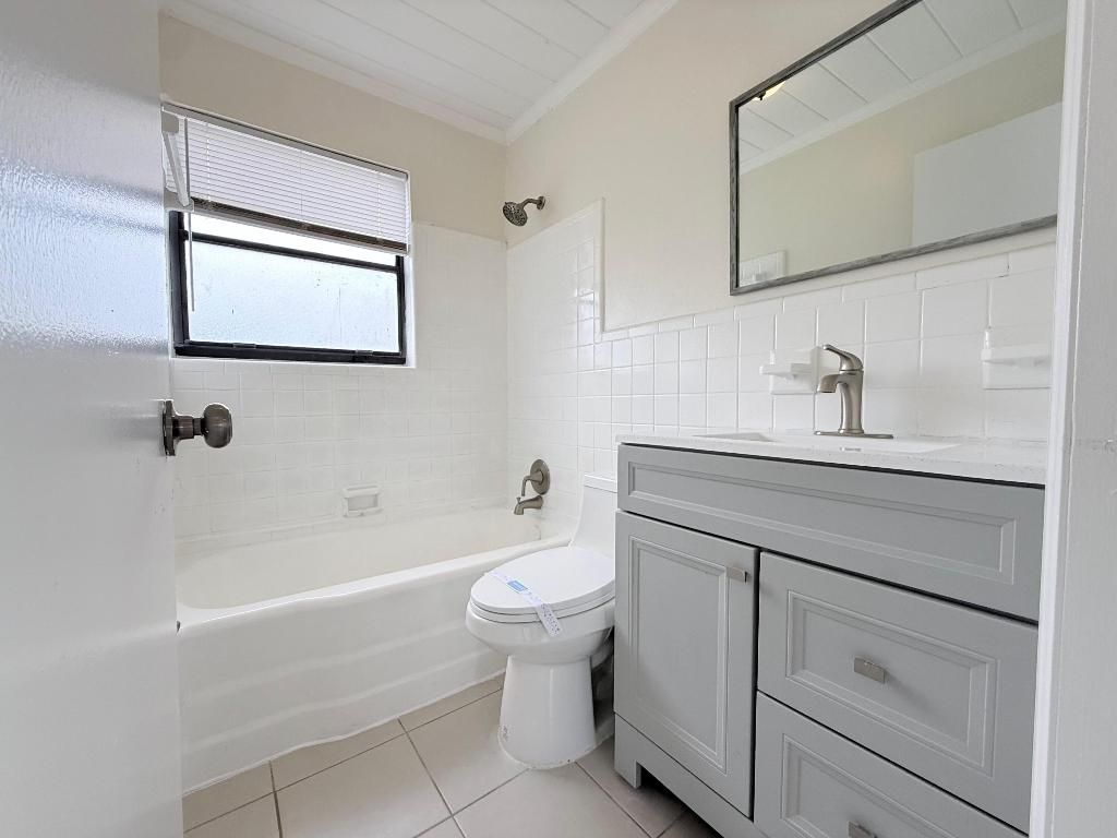 Photo of 1409 W 33rd Street #1, Riviera Beach, FL 33404 (MLS # R11137991)