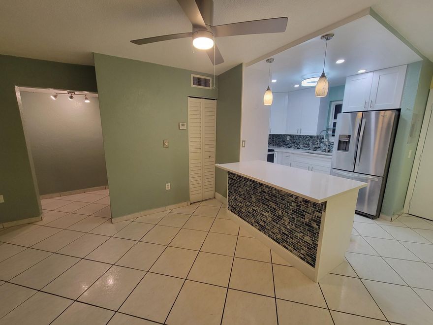 Beautiful 2BD/2BA condo in Palm East Gardens! This move-in ready unit offers an open layout, tile flooring throughout, and plenty of natural light. Enjoy a well-kept community with a pool, tennis courts, clubhouse, laundry, and assigned parking. Conveniently located near shopping, dining, and major highways — perfect for first-time buyers or investors! 
Recently renovated kitchen and bathrooms, incredible attention to detail. Pull out features on majority of cabinets, dual washer dryer is there to stay.