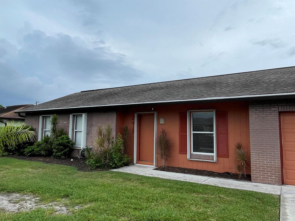 Photo of 2417 SW Avondale Street, Port St Lucie, FL 34984 (MLS # R10920750)