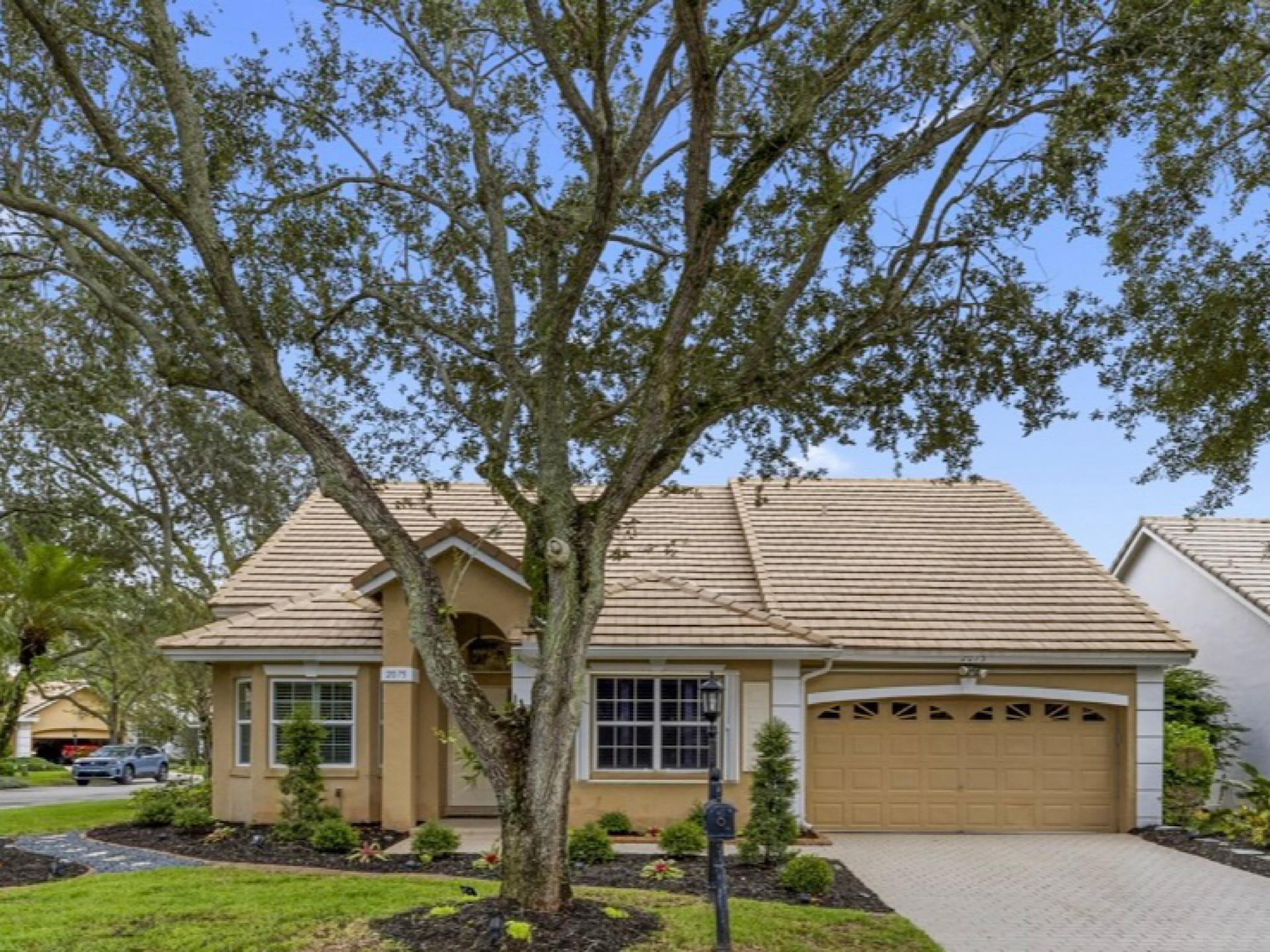Beautifully Updated Home on a Corner Cul-de-Sac Lot! This residence offers 3 bedrooms plus a versatile bonus room perfect as a den, office, or 4th bedroom. The open concept kitchen with soaring vaulted ceilings highlights an impressive 11-foot quartz peninsula with matching backsplash, lighted upper and lower cabinets, a wine fridge, and brand NEW KitchenAid appliances. French doors open to the screened patio, ideal for entertaining or everyday relaxation. Smart dimmer switches and high-tech lighting add modern convenience throughout. Luxury vinyl plank flooring flows seamlessly, complemented by exotic fixtures and fresh interior paint completing a stylish, truly move-in ready home.