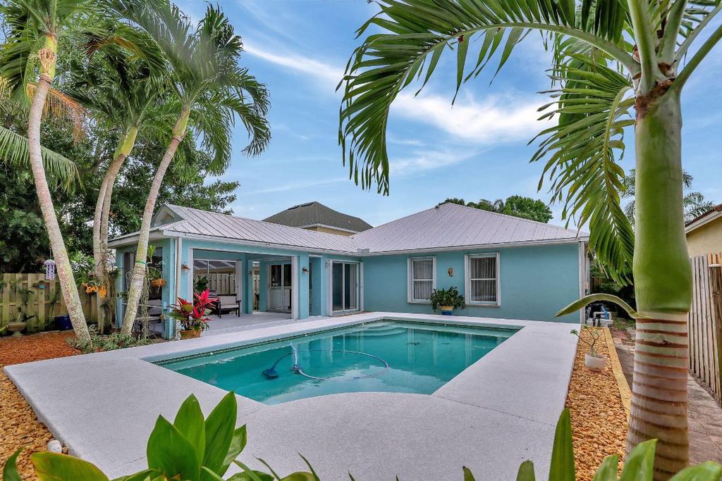 Photo of 1959 NW Marsh Rabbit Lane, Jensen Beach, FL 34957 (MLS # R10973570)