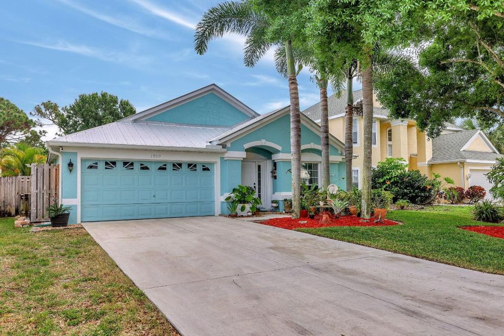 Photo of 1959 NW Marsh Rabbit Lane, Jensen Beach, FL 34957 (MLS # R10973570)
