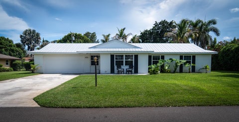 Photo of 8016 SE PALM Street, Hobe Sound, FL 33455 (MLS # B26072890)
