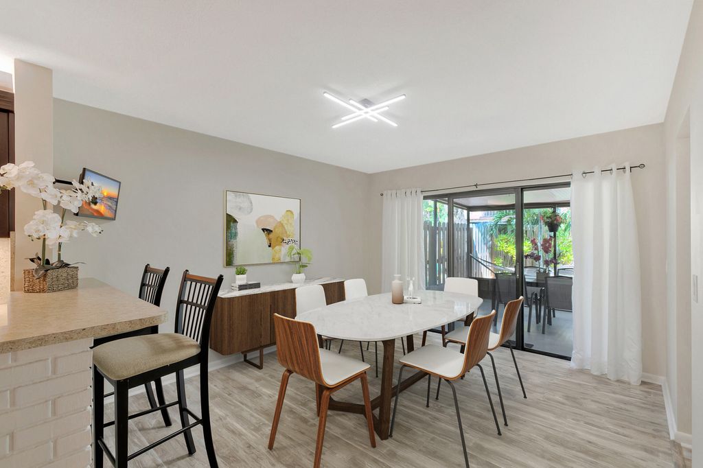 Photo of 3530 E Gardens East Drive E #B, Palm Beach Gardens, FL 33410 (MLS # R10946463)