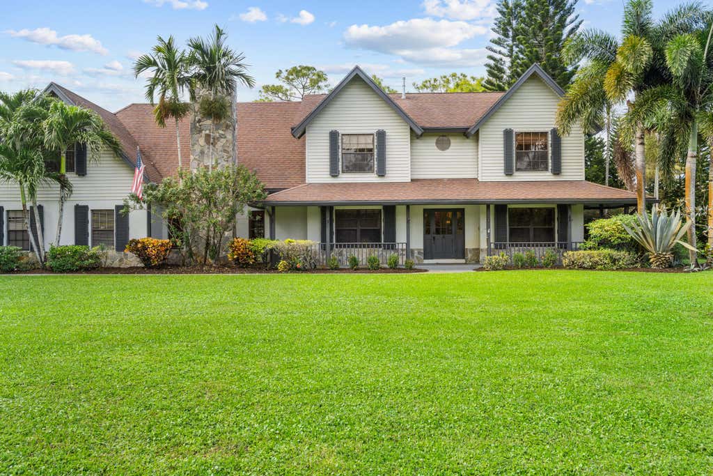 Photo of 5371 Cougars Prowl, Lake Worth, FL 33449 (MLS # B26045499)