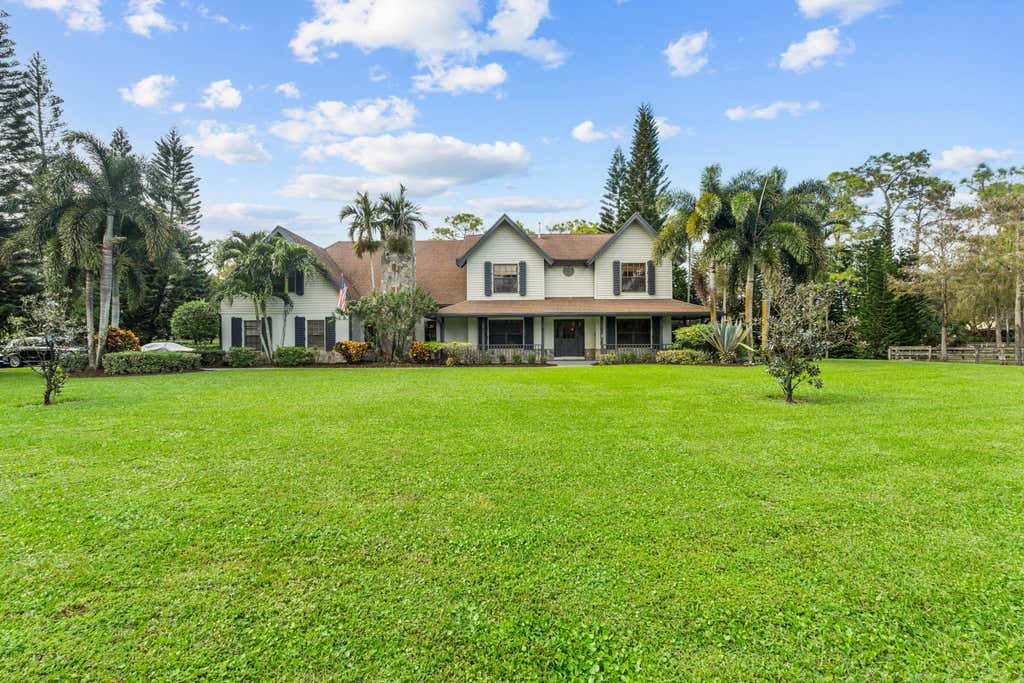 Photo of 5371 Cougars Prowl, Lake Worth, FL 33449 (MLS # B26045499)