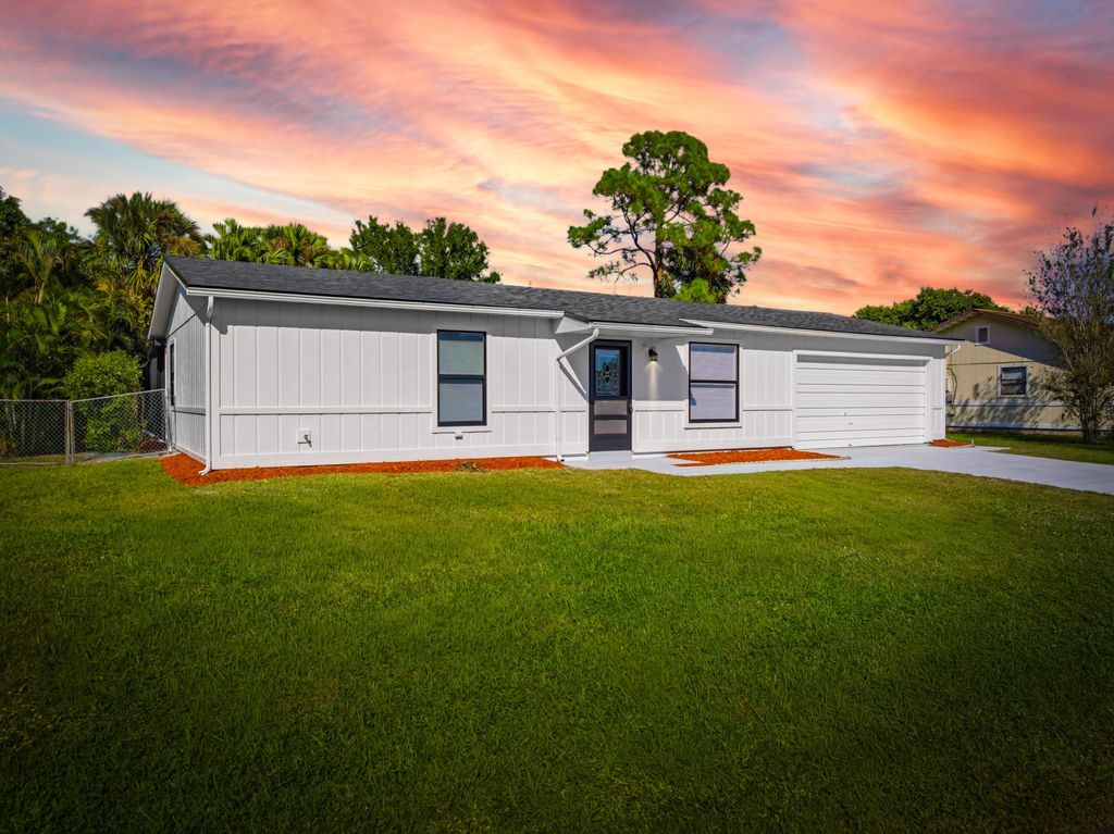 Photo of 1001 SW Romaine Lane, Port Saint Lucie, FL 34953 (MLS # R11141451)