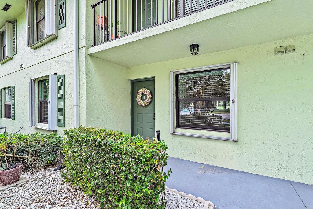 Photo of 301 Sabal Ridge Circle #C, Palm Beach Gardens, FL 33418 (MLS # R10936622)