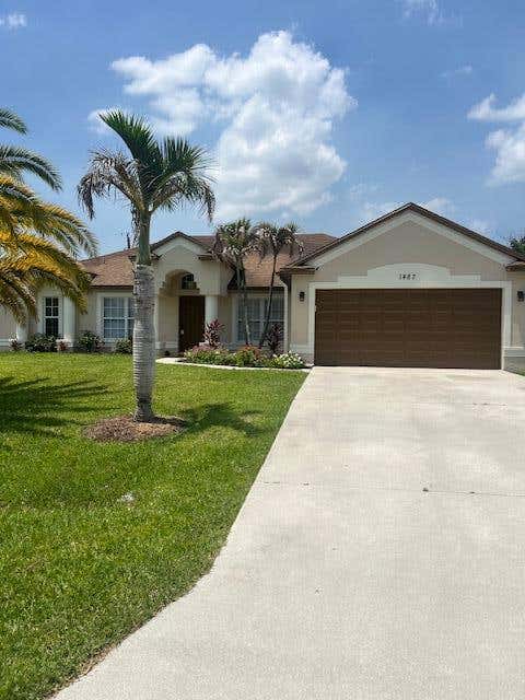 Photo of 1487 SW Herder Road, Port Saint Lucie, FL 34953 (MLS # B26045043)