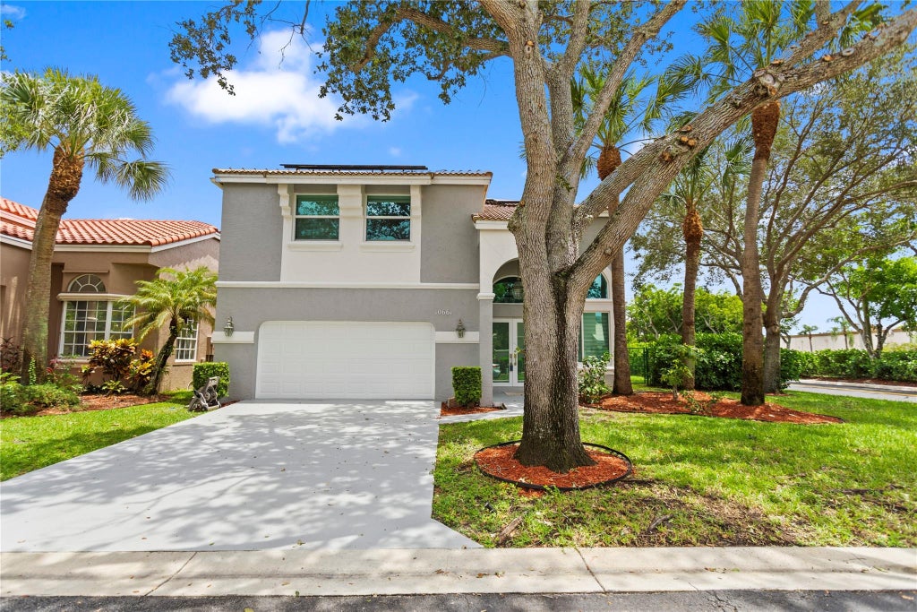 Photo of 10661 NW 47th Court, Coral Springs, FL 33076 (MLS # F10511966)