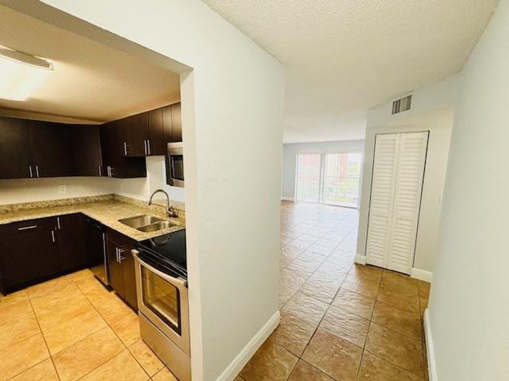 Photo of 2800 NW 56th Avenue #H407, Lauderhill, FL 33313 (MLS # F10556093)