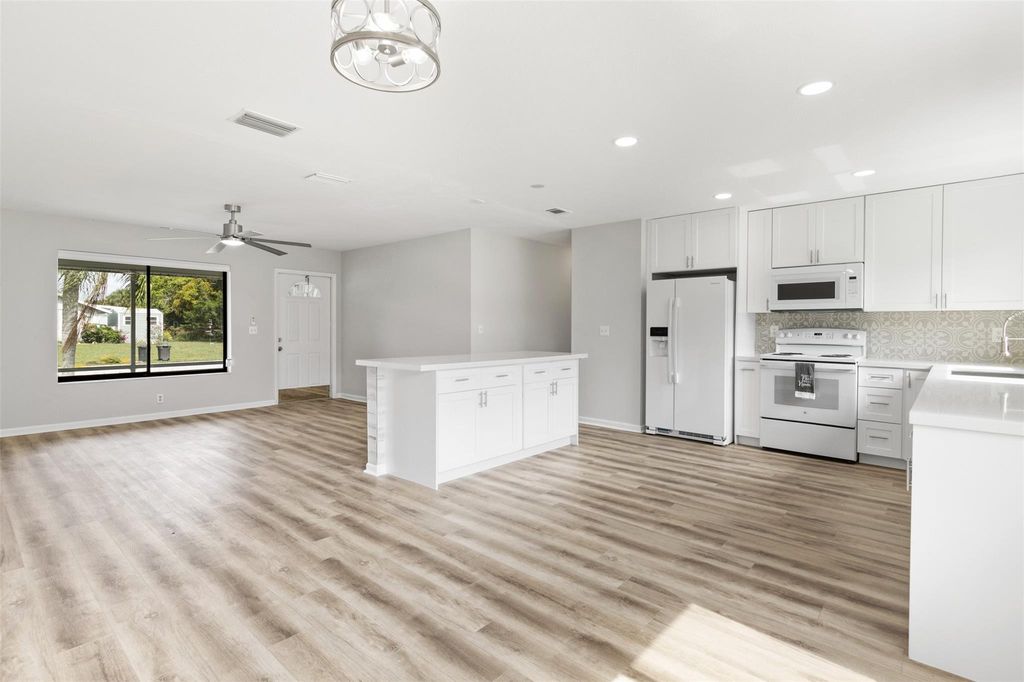 Photo of 1902 SE Burgundy Lane, Port Saint Lucie, FL 34952 (MLS # F10506774)