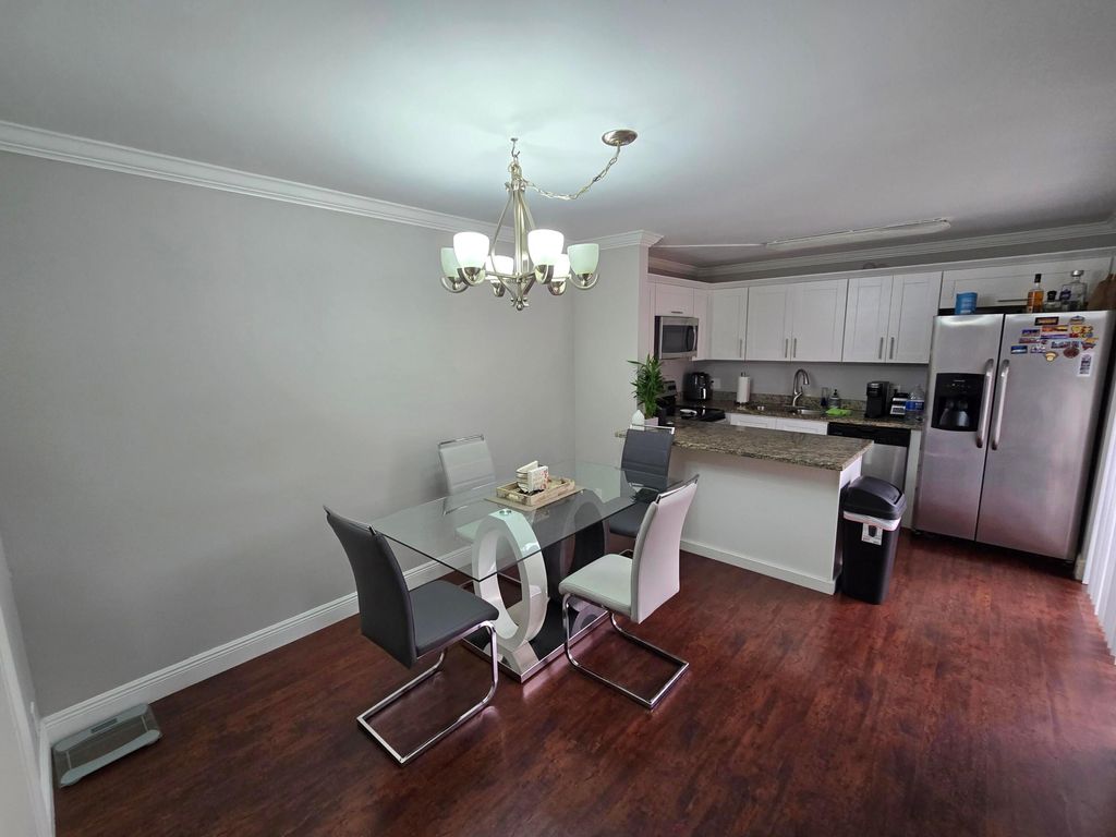 Photo of 1560 Forest Lakes Circle #B, West Palm Beach, FL 33406 (MLS # R11081358)