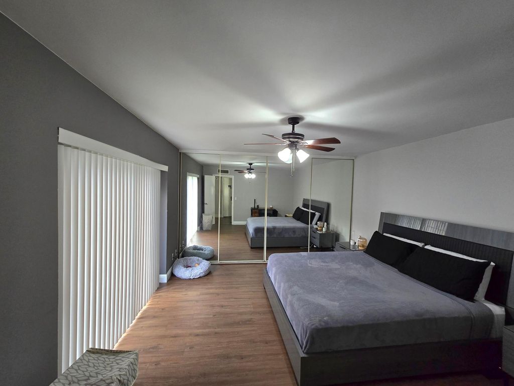 Photo of 1560 Forest Lakes Circle #B, West Palm Beach, FL 33406 (MLS # R11081358)