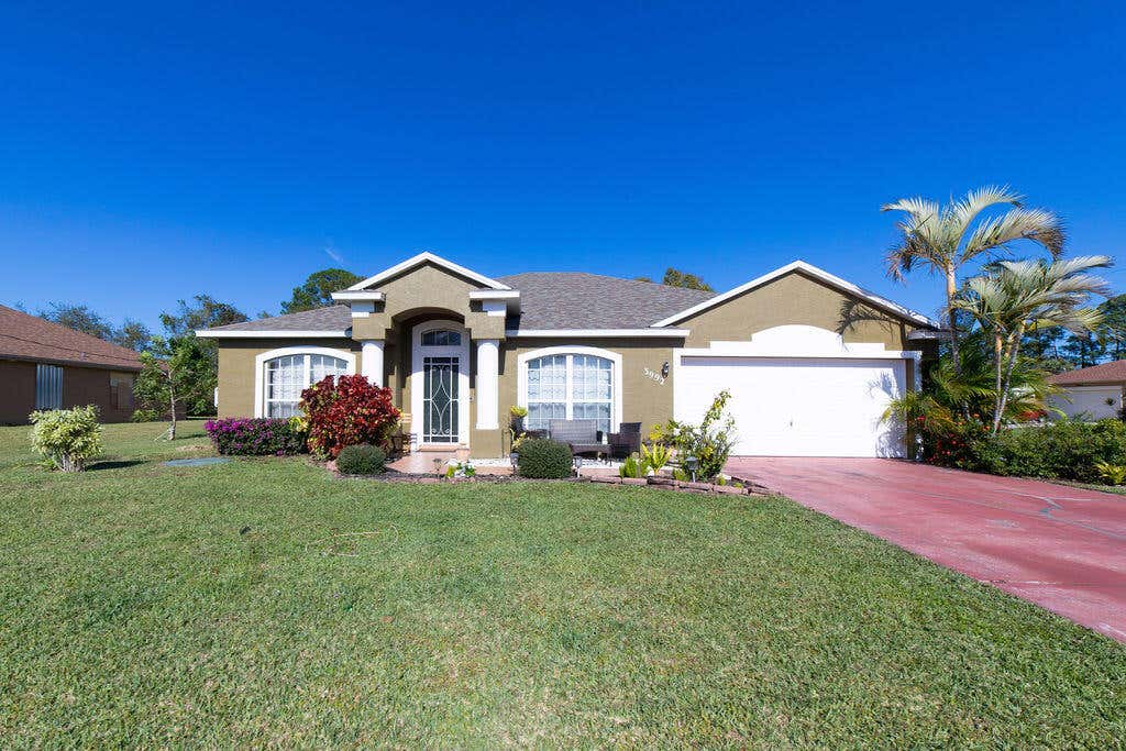 Photo of 3992 SW Cheribon Street, Port Saint Lucie, FL 34953 (MLS # R11051178)