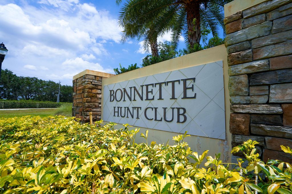 Photo of 101 Bonnette Hunt Club Lane, Palm Beach Gardens, FL 33418 (MLS # R10987460)