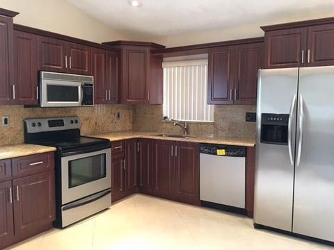 Tiny photo for 7526 SW 6th Street, North Lauderdale, FL 33068 (MLS # F10541470)