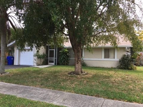 Tiny photo for 7526 SW 6th Street, North Lauderdale, FL 33068 (MLS # F10541470)
