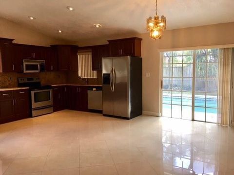 Tiny photo for 7526 SW 6th Street, North Lauderdale, FL 33068 (MLS # F10541470)