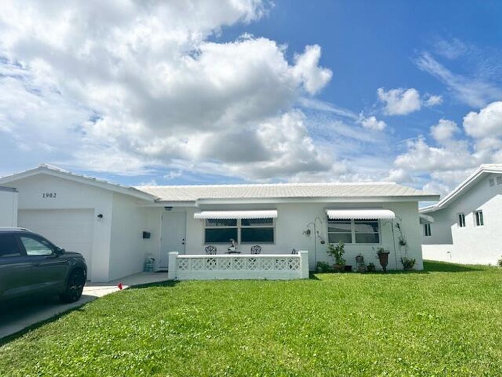 Photo of 1902 SW Roma Way, Boynton Beach, FL 33426 (MLS # R11108453)