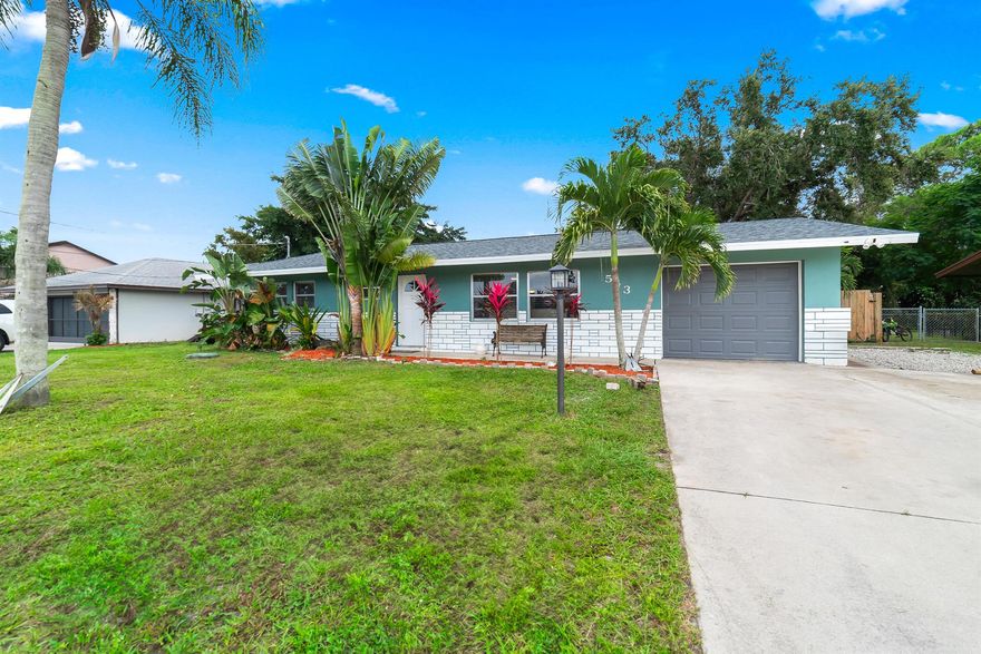 Located in the heart of Port St. Lucie, this charming home is central to everything you could want; shopping, dining, parks, and more! Nestled on over a quarter-acre of fully fenced property, this home offers plenty of space for your boat, RV, or any of your favorite toys, all with no HOA restrictions. Built with durable concrete block construction, this residence has been thoughtfully updated for peace of mind and comfort. Enjoy a brand new roof, new water heater, and a freshly serviced AC system with warranty. Additional upgrades include a new smart, hurricane-rated garage door and brand-new hurricane shutters for extra protection.
