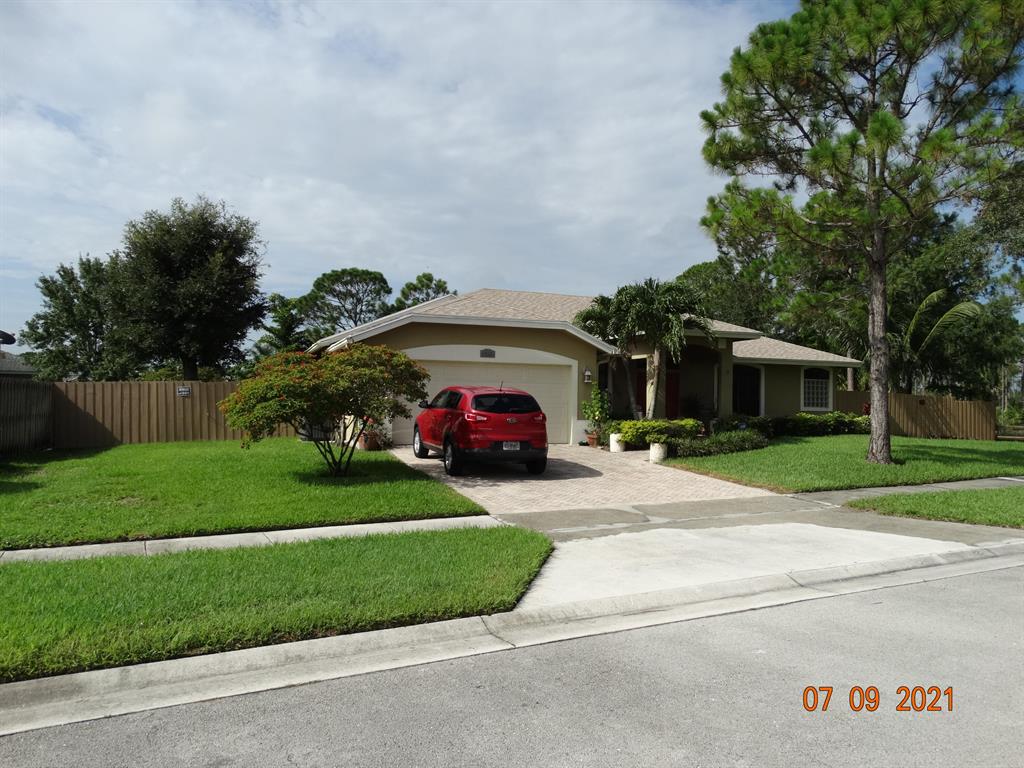 Rare find big house with big fully fenced lot and tropical fruit tree. Next door is the nature's park to explore. Ready to move in. Lots of upgrades, granite kitchen counter tops, stainless steel appliances, laminated wood floors, covered screened back patio overlooking the lush garden and tropical fruit trees. New roof in 2018, new water heater in 2015, new air conditioning unit in 2020 and the house is hurricane protected with shutters. Pets friendly neighborhood. Conveniently located close to grocery stores, banks and schools. Shown by appointment only. Owner occupied with a big dog in the house.