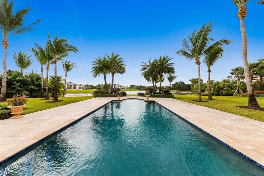 Stone Creek Ranch is Palm Beach County's most prestigious private estate home community with a prime location, excellent security and convenience, having access to all the finest shopping and dining, as well as three major Airports.  A private cul-de-sac location and moonlit long lake views make this the home you dream about.  A one-story, California Wine-Country inspired, Lakefront Estate sits on 2 1/2 acres of exquisitely landscaped grounds. Completed November 2015 by  Custom Estate builder, Terence Cudmore and designed by award-winning Architect, Randall Stofft, this home boasts many fine appointments, including an INDOOR POOL with an endless wave for a great workout.  PHOTO RENDERINGS FOR BUYERS' ALTERNATE 
DESIGN IDEAS  Great Room, Breakfast Area, Kitchen, Dining Room Office, Master