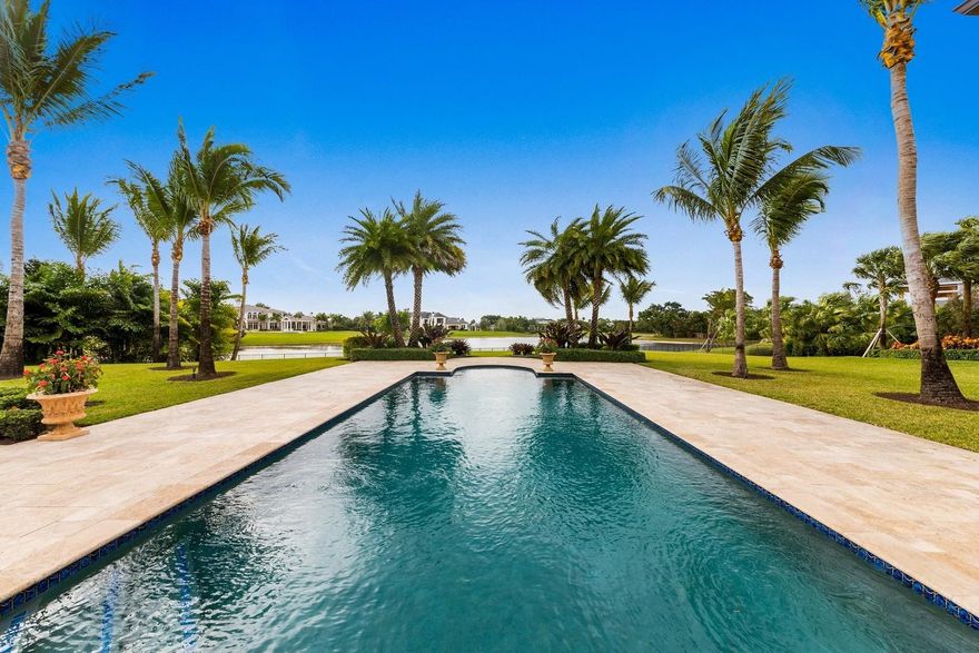 Stone Creek Ranch is Palm Beach County's most prestigious private estate home community with a prime location, excellent security and convenience, having access to all the finest shopping and dining, as well as three major Airports.  A private cul-de-sac location and moonlit long lake views make this the home you dream about.  A one-story, California Wine-Country inspired, Lakefront Estate sits on 2 1/2 acres of exquisitely landscaped grounds. Completed November 2015 by  Custom Estate builder, Terence Cudmore and designed by award-winning Architect, Randall Stofft, this home boasts many fine appointments, including an INDOOR POOL with an endless wave for a great workout.  PHOTO RENDERINGS FOR BUYERS' ALTERNATE 
DESIGN IDEAS  Great Room, Breakfast Area, Kitchen, Dining Room Office, Master This impressive home has sensational curb appeal.  Arrive and enjoy the magnificent grounds, stone columned, hedged, palm-tree-lined circular drive, plus ample parking through a porte cochere and a 4-car garage.  Custom Mahogany entry doors open to a breathtaking wall of windows capturing  glistening custom pool & long lake views, framed with symmetrical palm-tree landscape designs. Outdoor entertainment is easy with numerous covered and open spaces for lounging and a BBQ grill area for dining.  Every room in the house reflects the custom finishes and intricate detail done by a recognized professional Interior Designer to create the atmosphere...Including Indonesian marble flooring, wide-planked custom wood floors, wood framed windows and oversized wood trimmed sills, exquisite wood detailed ceilings interior and exterior, Brick style arched ceiling detail at formal dining room,  Kitchen appointments .... Alderwood kitchen cabinetry, Copper framed cooktop hood, Natural Gas for cooking, 
Top of the line appliances.


GENERATOR 
IMPACT GLASS
INDOOR EXERCISE POOL w/ENDLESS WAVE, 
BBQ GRILL AREA

AQUARIUM AT OFFICE
600 Gallon Saltwater Reef Aquarium featuring a variety of colorful live corals and tropical reef fish.  This custom saltwater aquarIum was professionally desIgned and built with state-of-the-art equipment  including automated systems that assist with maintenance.  The aquarium equipment has backup power from the built-in house generator to keep it running if the main power service is interrupted.  The homeowner has had the aquarium maintained and inspected regularly by a local Salt Water Tank Specialist to keep it in excellent condition.

.