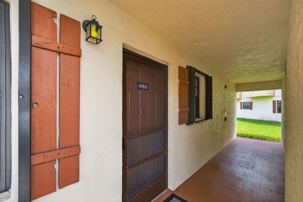 Photo of 4169 Oak Terrace Drive, Greenacres, FL 33463 (MLS # B26020785)