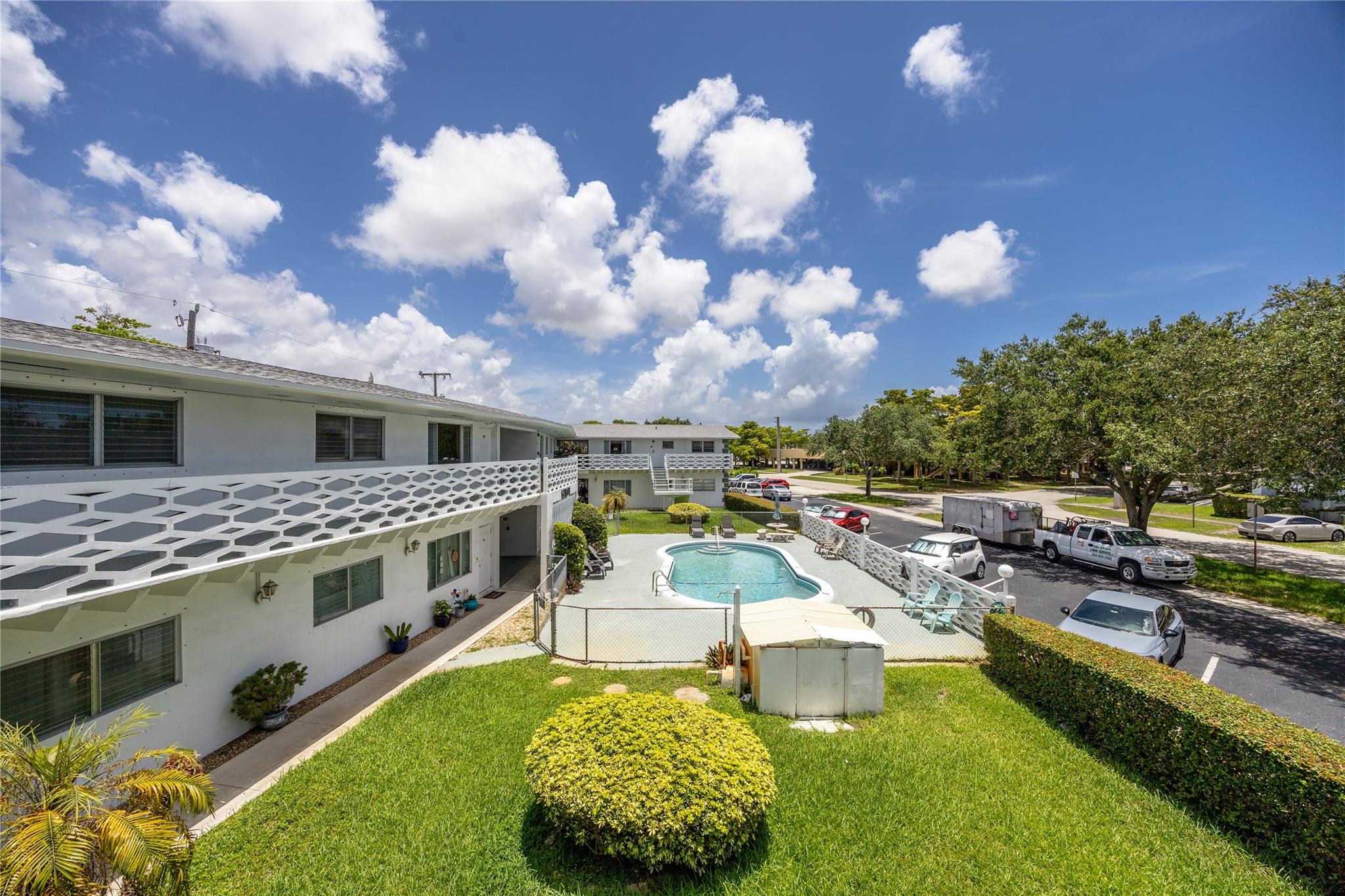 This fully furnished, inviting 1-bedroom, 1-bath unit is located in a well-kept 2-story boutique co-op, ideally situated near Central Hollywood’s top shopping, dining, and entertainment options. This intimate 55+ community offers comfort, convenience, and a peaceful lifestyle. Residents enjoy access to a community pool, on-site laundry facilities, and a dedicated storage unit—everything you need for easy living. **New roof completed in 2025. Cats welcome - sorry no doggies. No leasing allowed which promotes a stable and owner-occupied environment. No land lease but sale must be cash only. Move in ready, just bring your toothbrush!! A rare find in an unbeatable location—schedule your showing today!