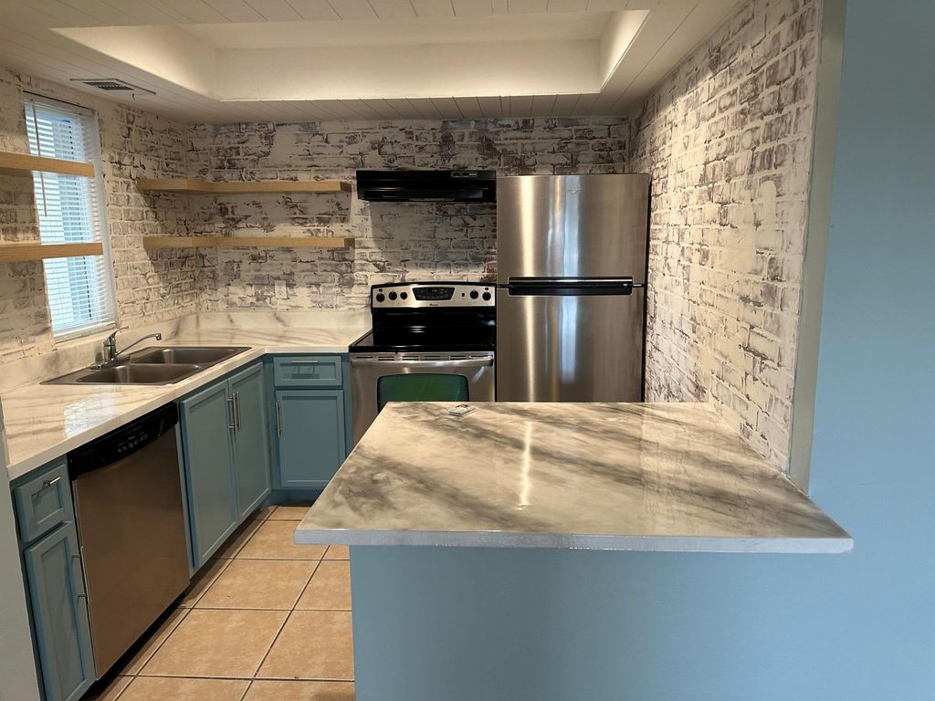 Photo of 1563 SE Royal Green Circle #101, Port Saint Lucie, FL 34952 (MLS # R10942675)