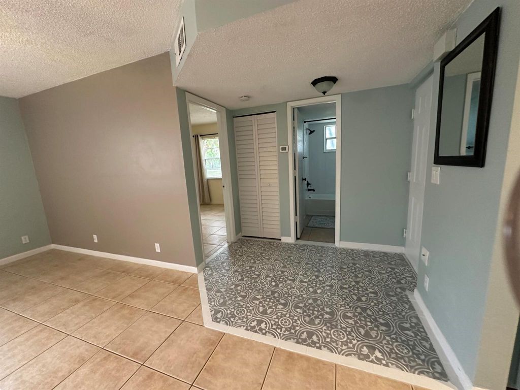 Photo of 1563 SE Royal Green Circle #101, Port Saint Lucie, FL 34952 (MLS # R10942675)