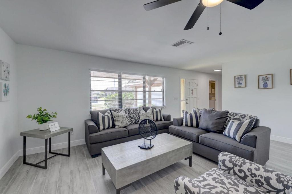 Photo of 543 SE Greenway Terrace, Port Saint Lucie, FL 34983 (MLS # R11156253)