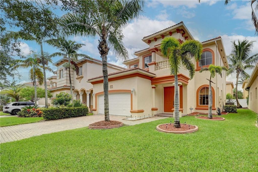Photo of 502 Gazetta Way, West Palm Beach, FL 33413 (MLS # F10406263)